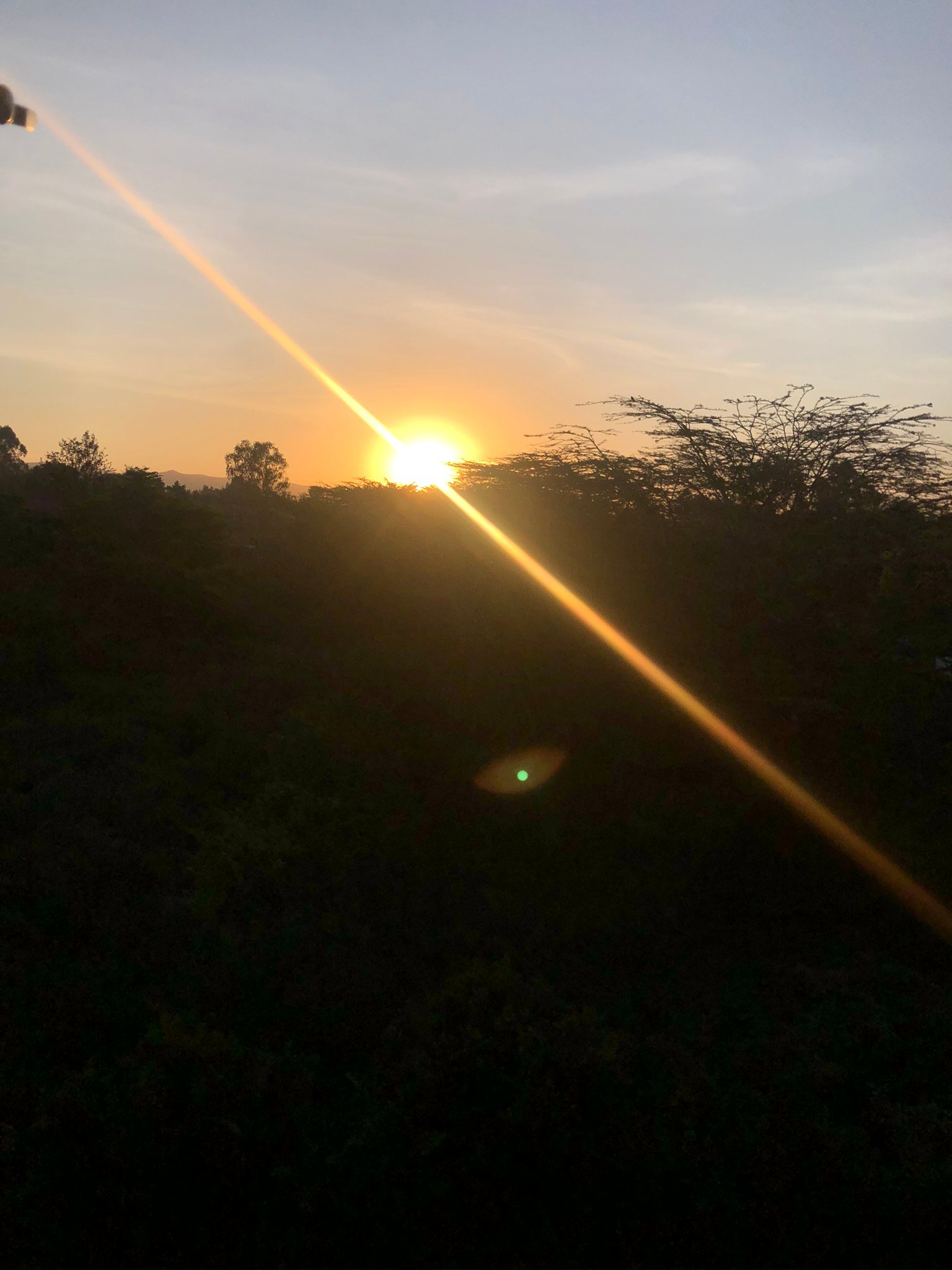 Sunset over Nairobi near Karen and the park edge